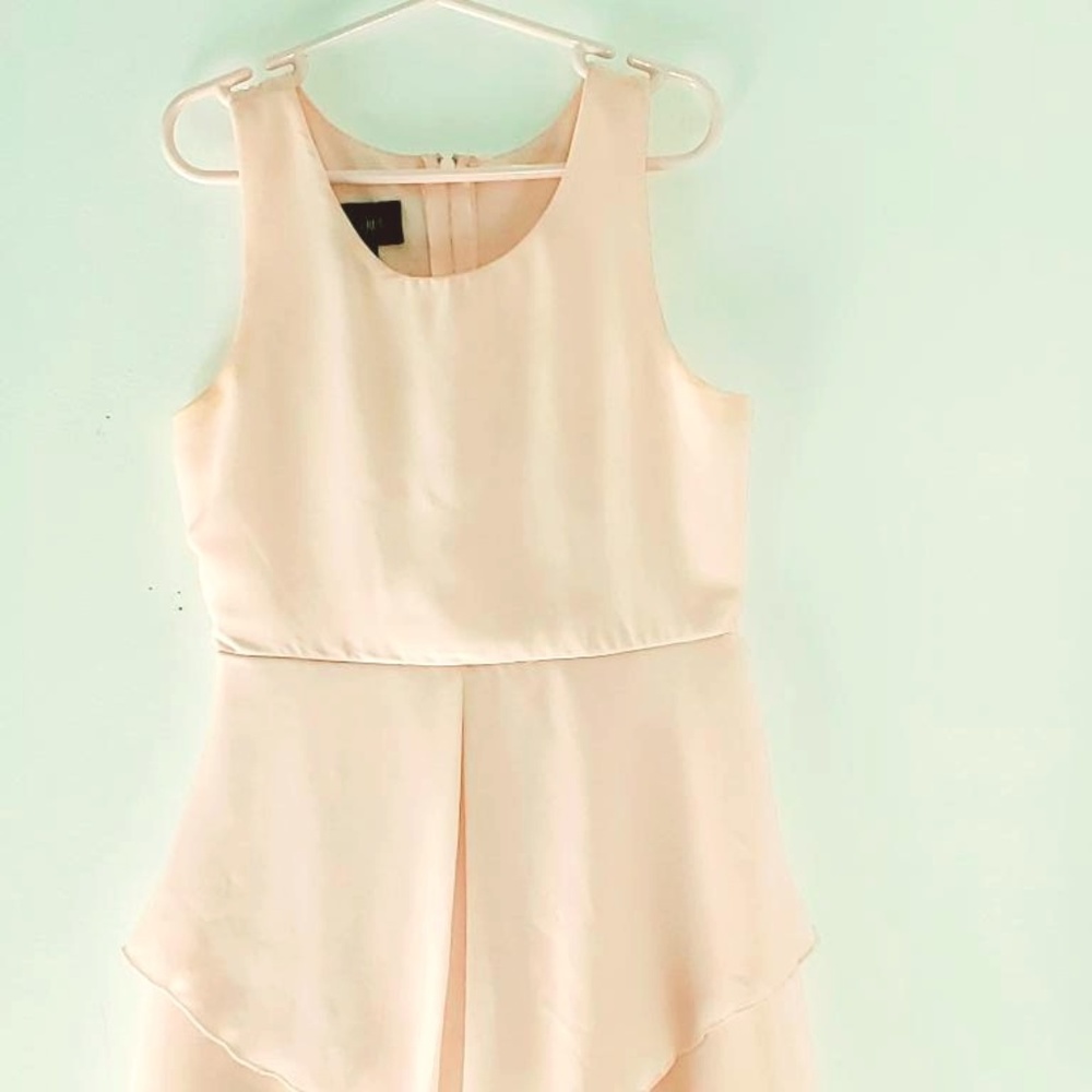 Soft pink dress with flowy tween dress.